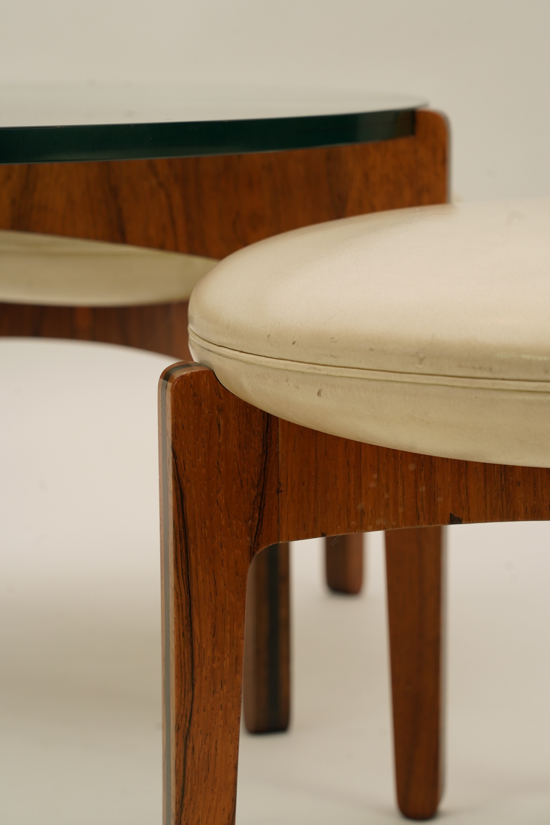 Sven Ellekaer (Danish, 1926-1984) for Christian Linneberg Møbelfabrik: A coffee table and three nesting stools ensuite